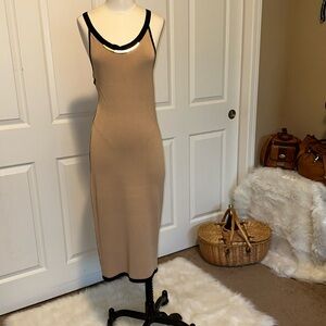 Gorgeous Bebe dress in a size Large NWT